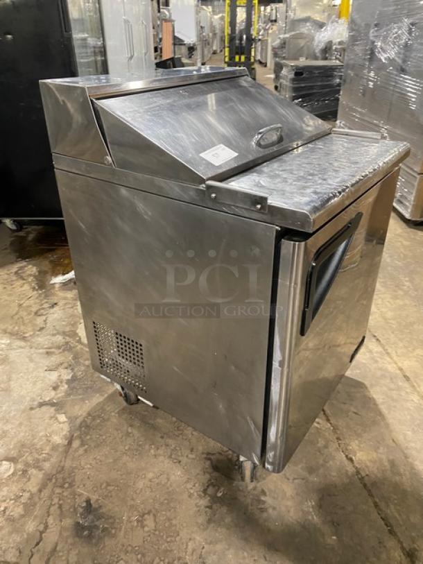 Turbo Air TST-28SD refrigerated prep table, stainless steel, single door, poly coated wire rack, on casters.