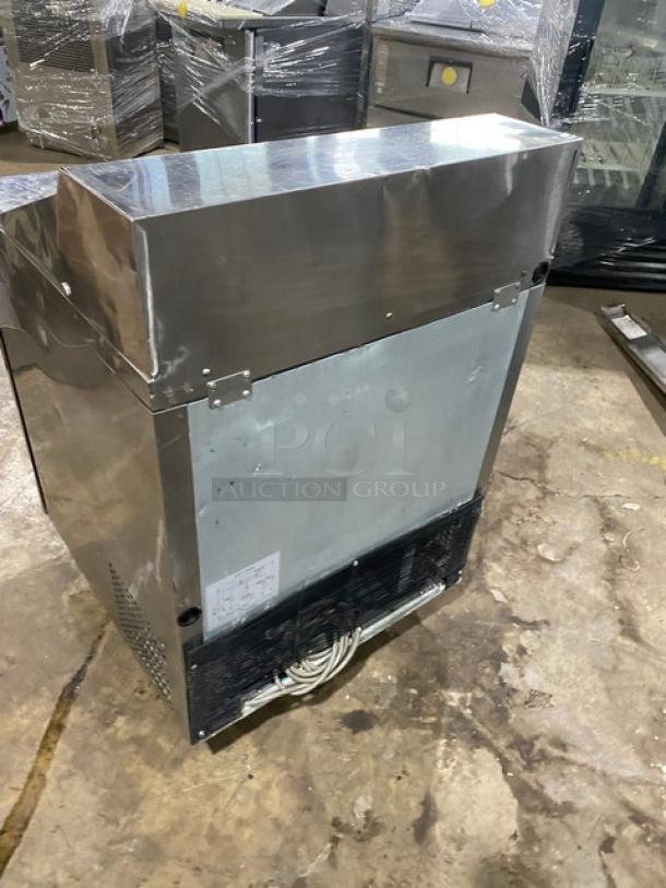 Turbo Air Super Deluxe Series stainless steel refrigerated prep table TST-28SD, 115V, with casters, back view.