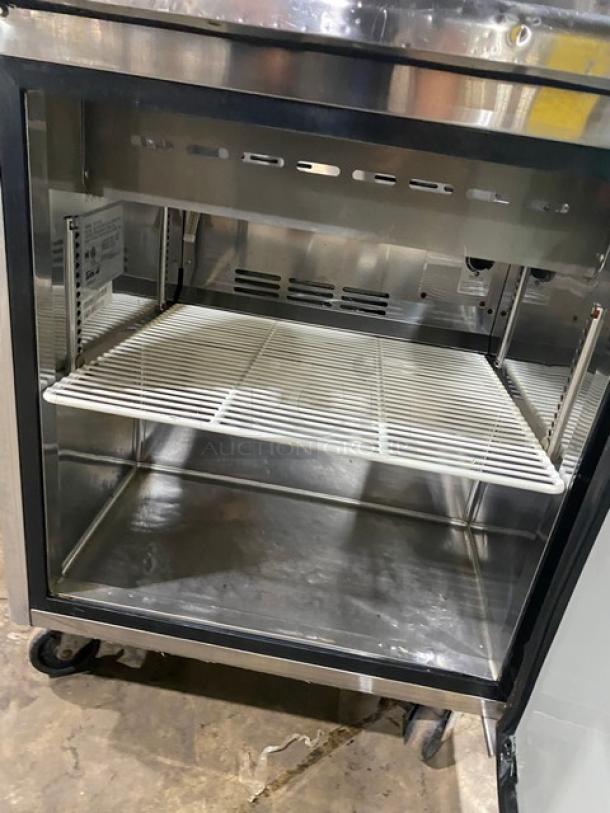 Turbo Air TST28SD Super Deluxe single door prep table, stainless steel, with poly coated rack and casters, 115V.