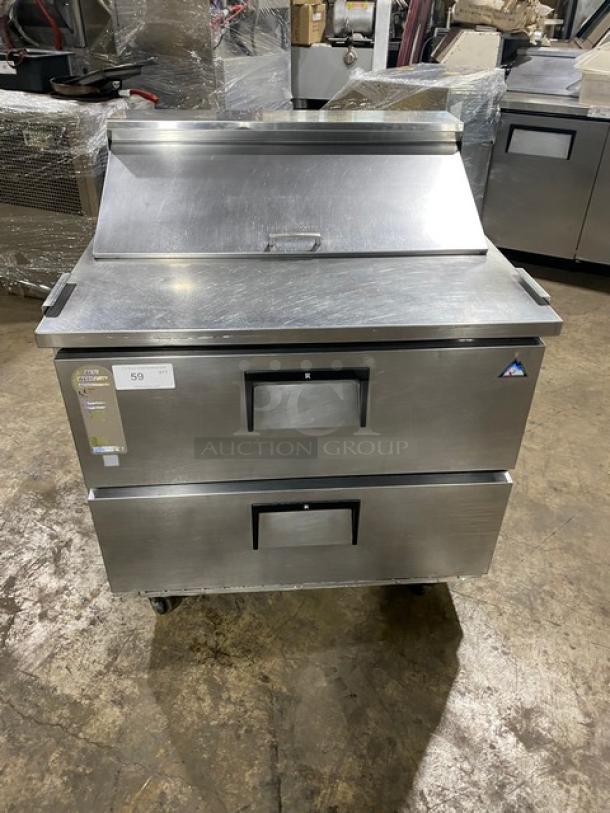 Everest commercial stainless steel 2-drawer refrigerated prep table on casters, ideal for salads/sandwiches.