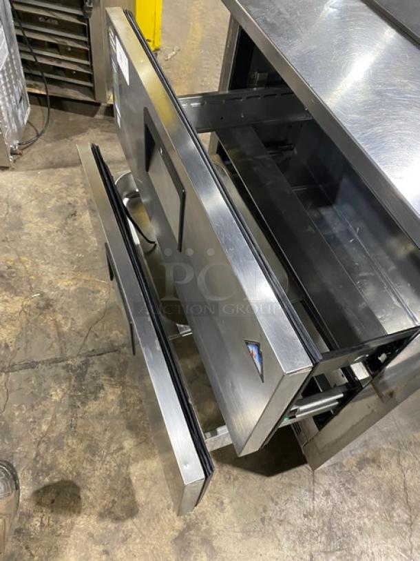 Everest commercial stainless steel 2-drawer refrigerated prep table on casters, open drawers, excellent condition.