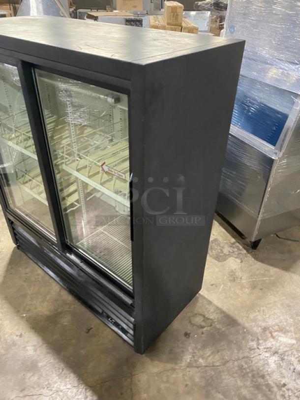 True Commercial Black Double Glass Sliding Door Merchandiser Refrigerator, Model GDM-41SL-54, with poly-coated wire racks.