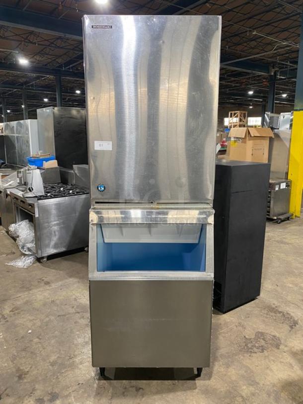 Hoshizaki stainless steel ice making machine with storage bin, electric powered, on legs, excellent condition.