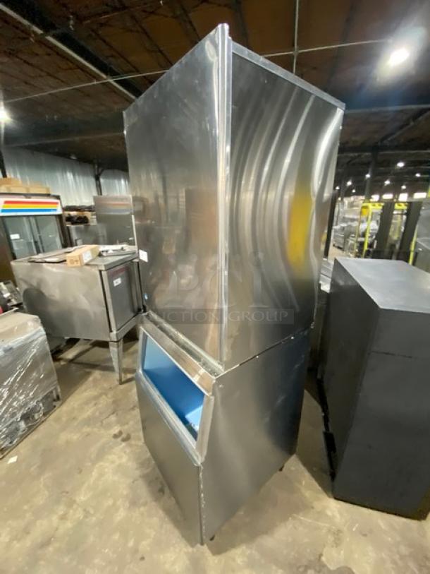 Hoshizaki stainless steel commercial ice maker and storage bin combo on legs, electric-powered, in good condition.