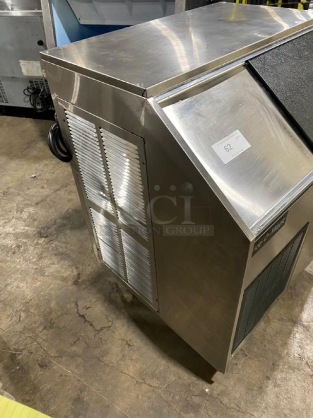 Ice-O-Matic EF250A32S stainless steel flake ice maker/bin combo with sliding lid, air-cooled, 115V, on legs.