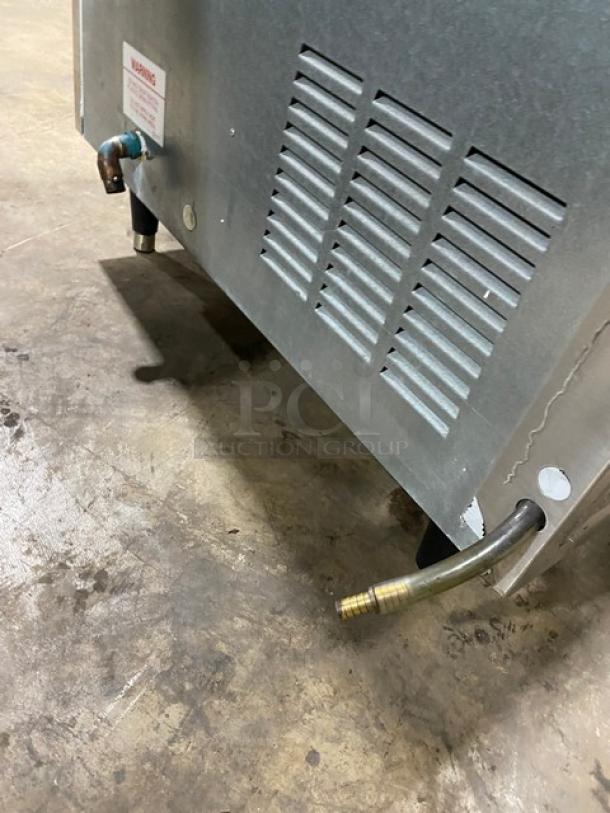 Ice-O-Matic EF250A32S commercial ice machine, stainless steel, air-cooled, flake style, on legs, with sliding lid, 115V.