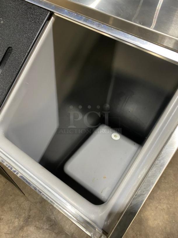 Ice-O-Matic EF250A32S commercial ice machine, stainless steel, flake style, sliding lid, 115V 1 phase, on legs.