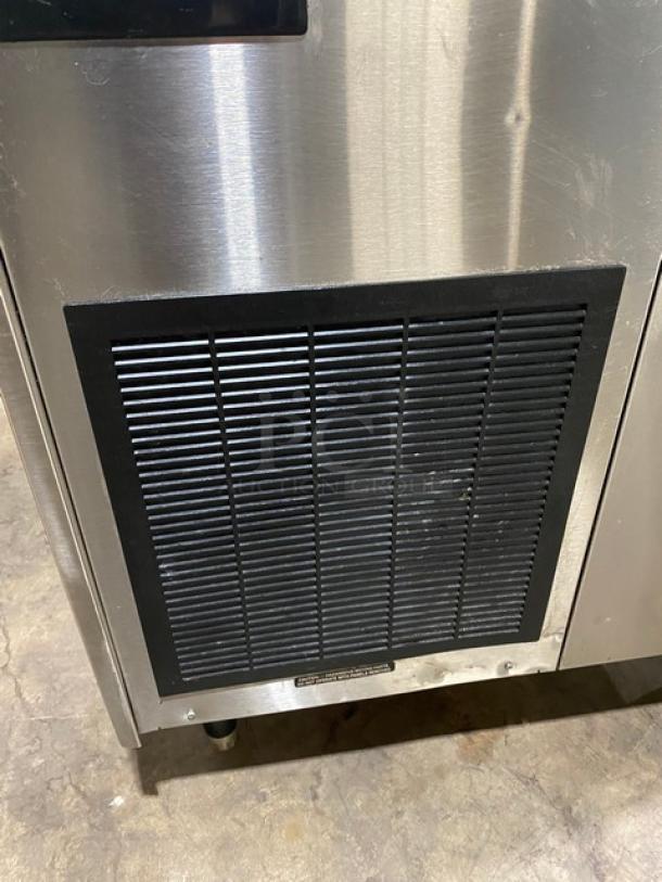 Ice-O-Matic EF250A32S flake ice maker, stainless steel, air-cooled, electric, sliding top lid, on legs, 115V.
