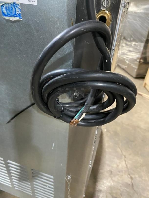 Ice-O-Matic EF250A32S commercial ice maker, stainless steel, air-cooled, 115V, with wiring visible, coiled cable attached.