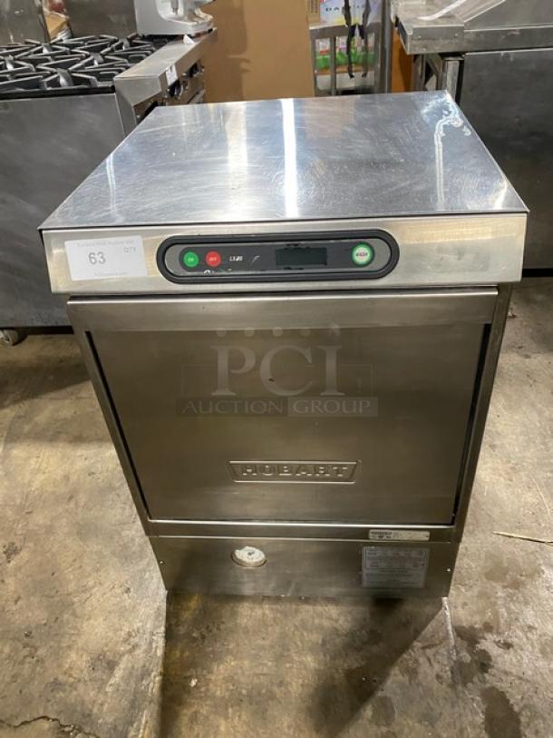 Hobart stainless steel undercounter dishwashing machine, electric powered, 120/208V 1 phase, good condition, control panel visible.