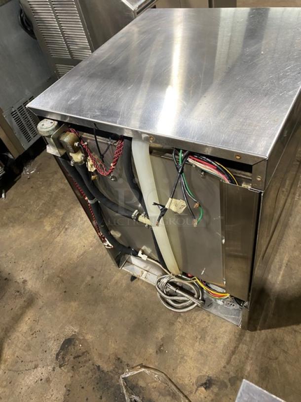 Hobart commercial undercounter dishwasher, stainless steel, electric-powered. Visible wiring and hoses, good condition. 120/208V, 1 phase.