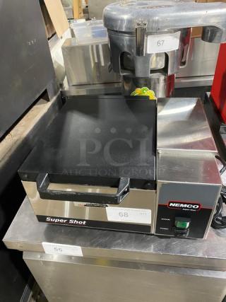 Nemco Commercial Stainless Steel Electric Countertop Super Shot Portion Steamer, Model 6600, in good condition, 120V on legs.