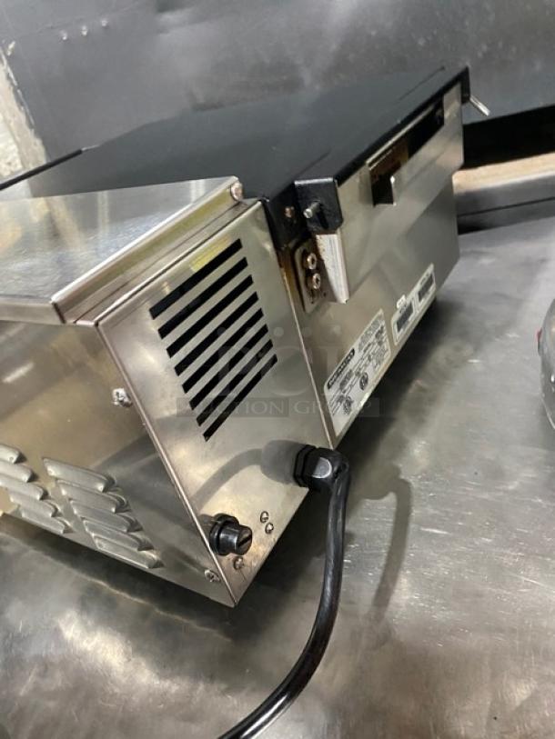 Nemco Commercial Stainless Steel Electric Countertop Portion Steamer, Model 6600. Features durable build, 120V, with legs.