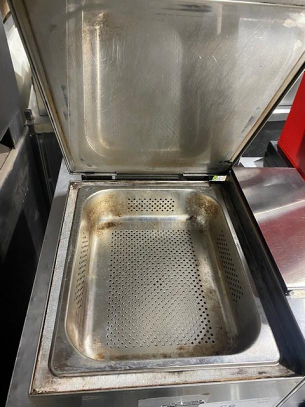 Nemco Commercial Stainless Steel Super Shot Portion Steamer, Model 6600 SN: F22-2967, 120V, on legs, open lid showing interior.