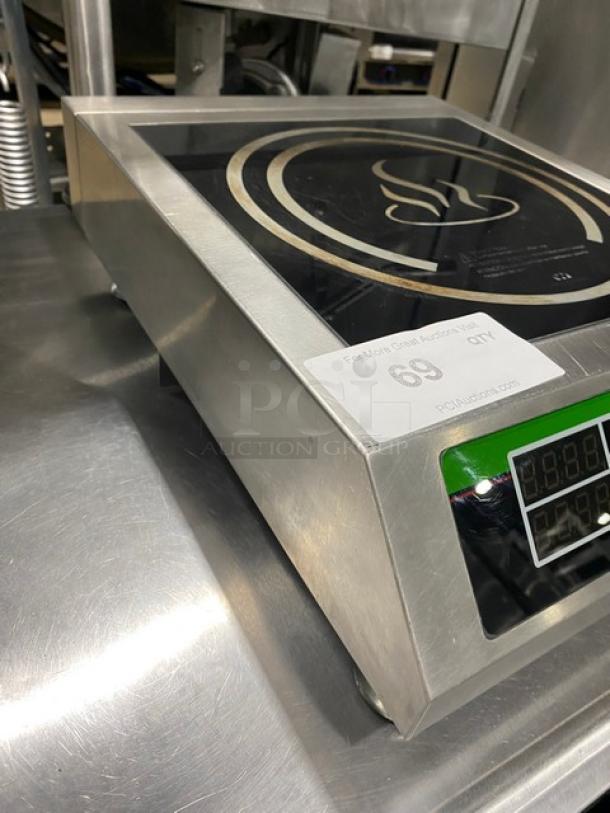 Winco Spectrum Series stainless steel single induction range, model EICS-18, 120V, with digital display, on legs.