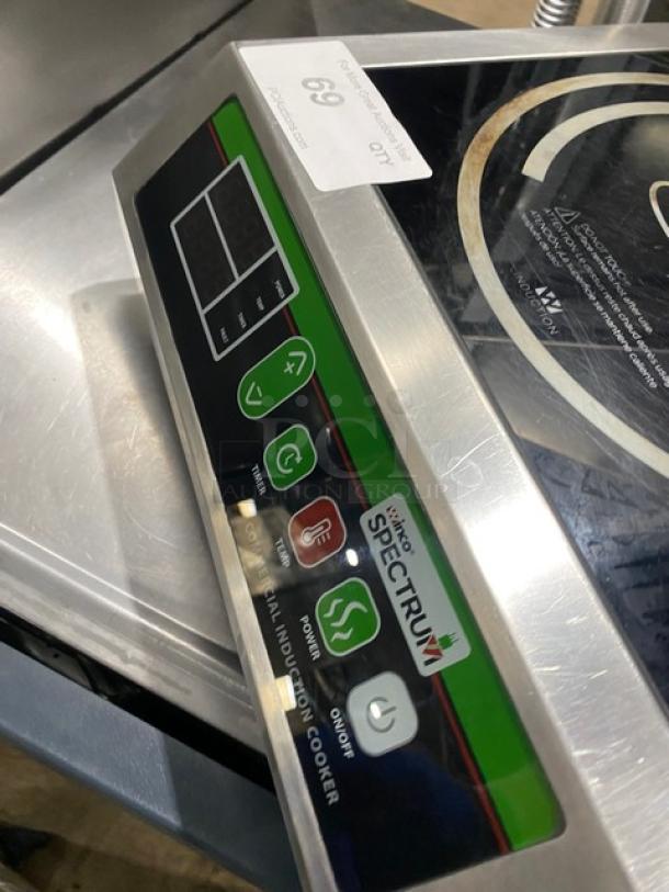 Winco Spectrum Series EICS18 countertop induction range, stainless steel, electric, on legs, excellent condition, 120V.