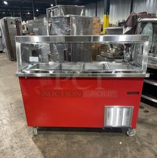 Delfield Shelleyglas red stainless steel 4-well cold salad bar with sneeze guard, model KCSC-60-EF, on casters, 115V.