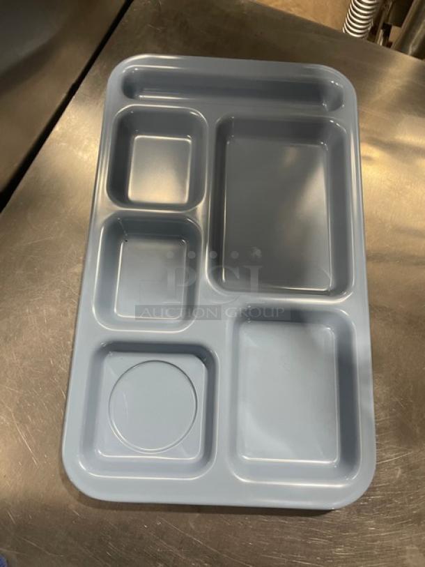 New Carlisle tray, model 4398259, slate blue melamine, 6 compartments, rectangular 15"x9", for cafeteria use.