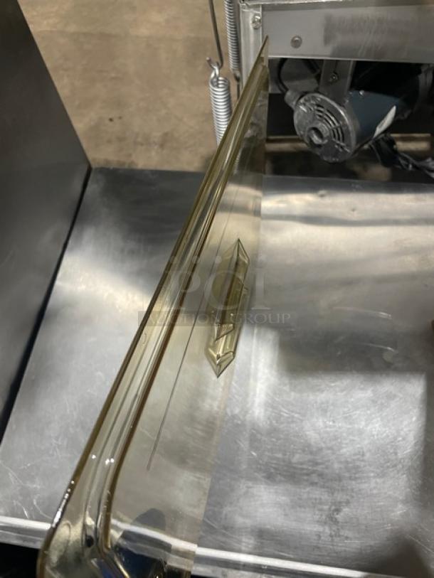 New Cambro H-Pan 10HPCHN150 amber high-heat full-size lid with spoon notch and handle, excellent condition.