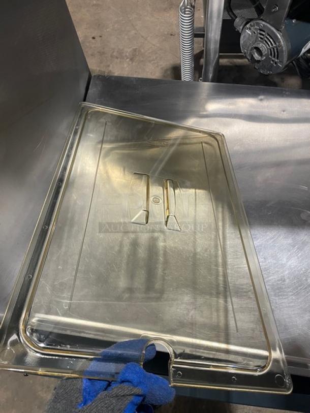 Cambro H-Pan flat lid, amber, full-size, with spoon notch, model 10HPCHN150. New condition, high heat, commercial use.