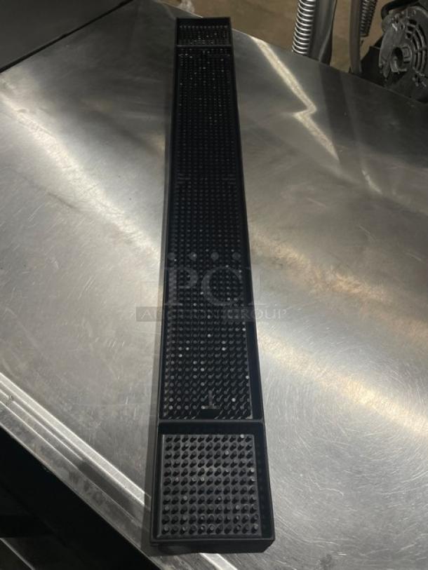 Update International BM27BK black rubber bar mat, 27 inches, new condition. Durable commercial-grade surface.