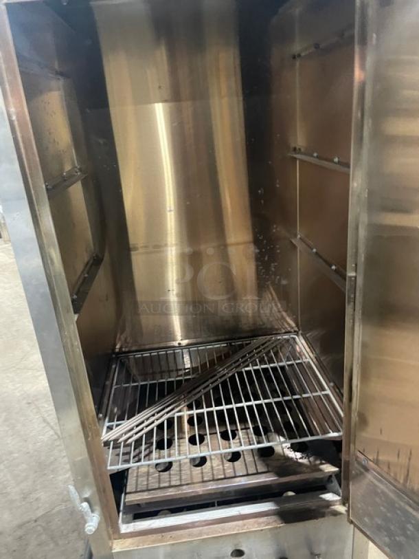 L&J CWSH-30 stainless steel smokehouse oven, natural gas-powered, free-standing, on legs, interior view, clean condition.