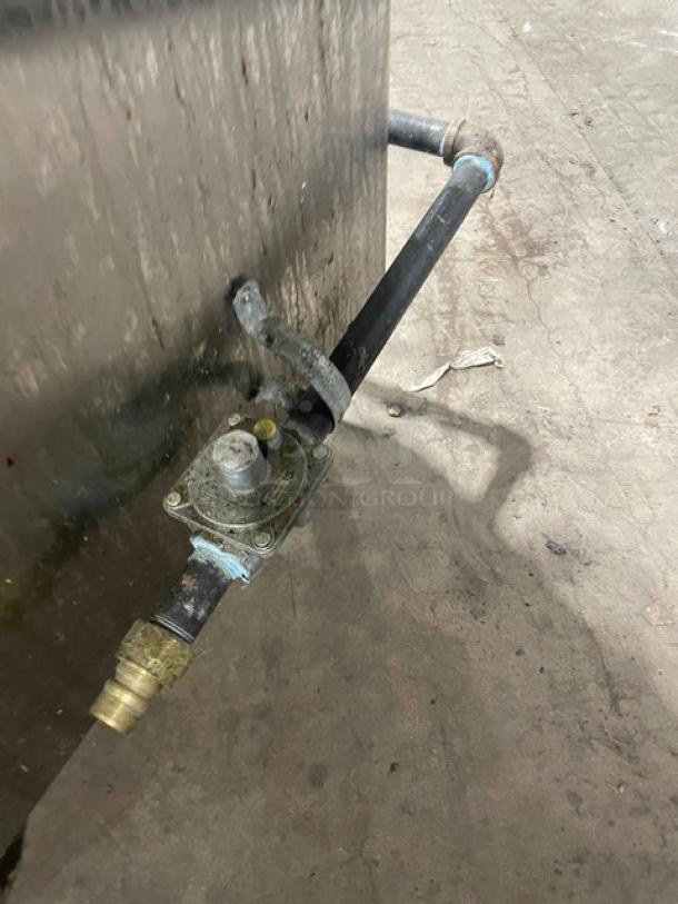 L&J CWSH-30 smokehouse oven gas connection, featuring natural gas fittings; visible wear, but appears functional.