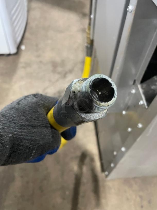 Cookline gas connection hose for stainless steel 4-burner range/oven combo. Durable with secure fitting.