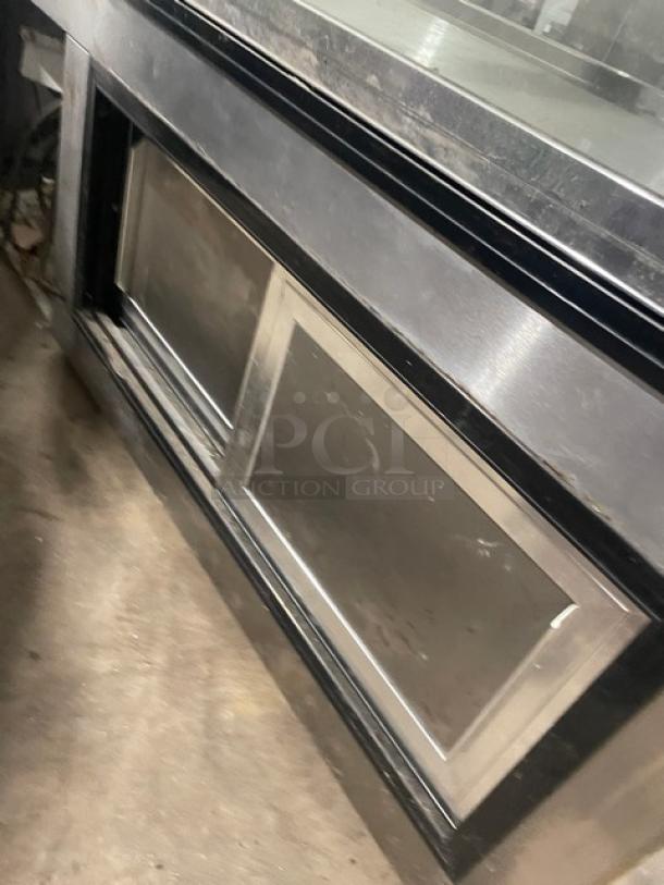 Leader 60" commercial stainless steel refrigerated deli display, model NRHD60SC, curved glass, rear sliding doors, 115V.