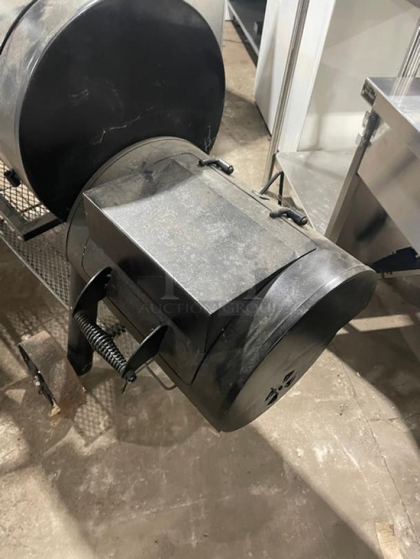 Brinkmann Professional Series offset smoker/grill, charcoal powered, black finish, used condition, ideal for BBQ enthusiasts.