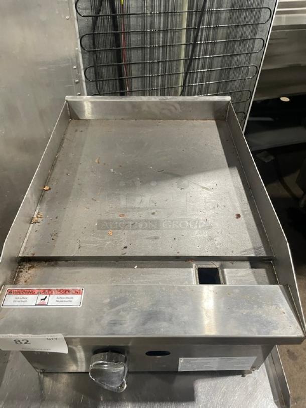 Adcraft stainless steel gas-powered countertop flat griddle, model ECTG16NG, with back and side splash, on legs, used condition.