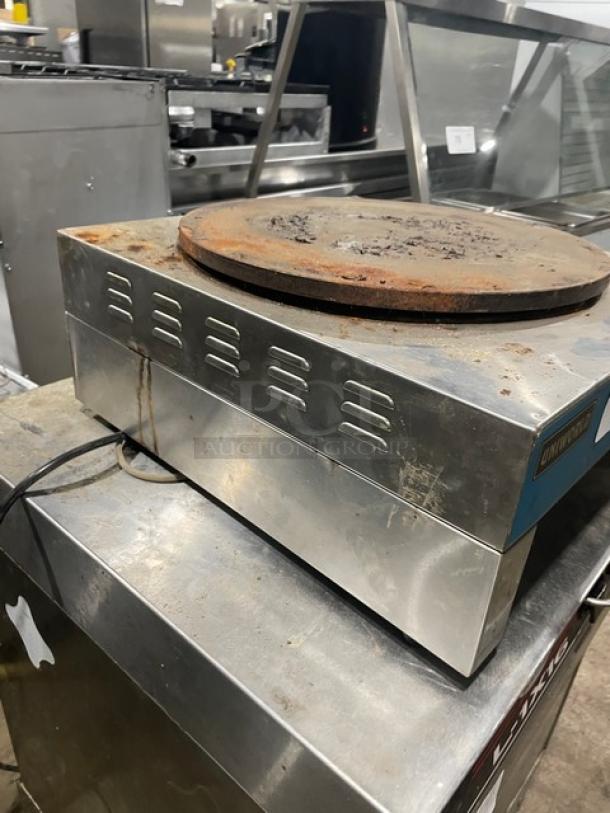 Uniworld stainless steel electric crepe maker, model UMPE-CH, with 15.75" carbon steel plate and thermostatic control.