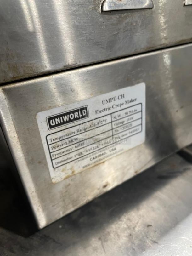 Uniworld stainless steel electric crepe maker with 15.75" polished steel plate, thermostatic control, model UMPE-CH, SN: 130005.