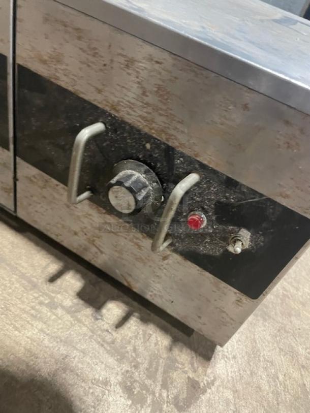 Star Commercial Stainless Steel Electric Warming Drawer, single free-standing unit, visible wear, adjustable knobs, and indicator light.