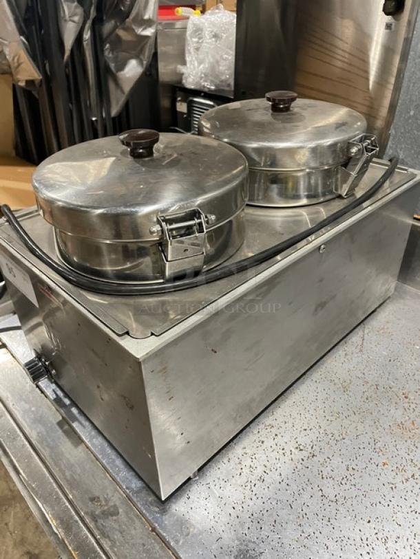 Server stainless steel electric countertop twin soup/topping warmer, with two lidded pots. Used condition.