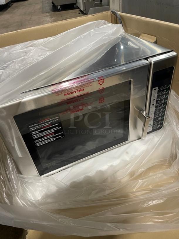 NEW Menumaster RFS12TSW stainless steel countertop microwave oven with digital push button controls, 120V, in packaging.