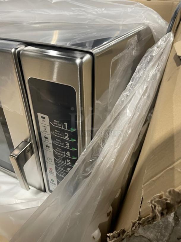 NEW Menumaster RFS12TSW commercial stainless steel microwave oven with digital controls, 120V. In original packaging.