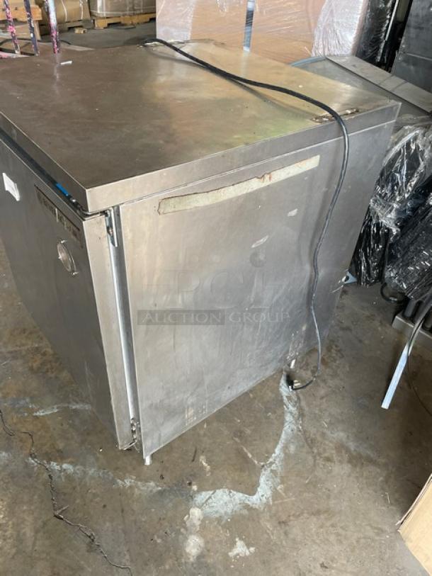 Beverage-Air WTF27A stainless steel worktop freezer, single door, 27", with poly-coated wire rack, on legs, 115V, used condition.