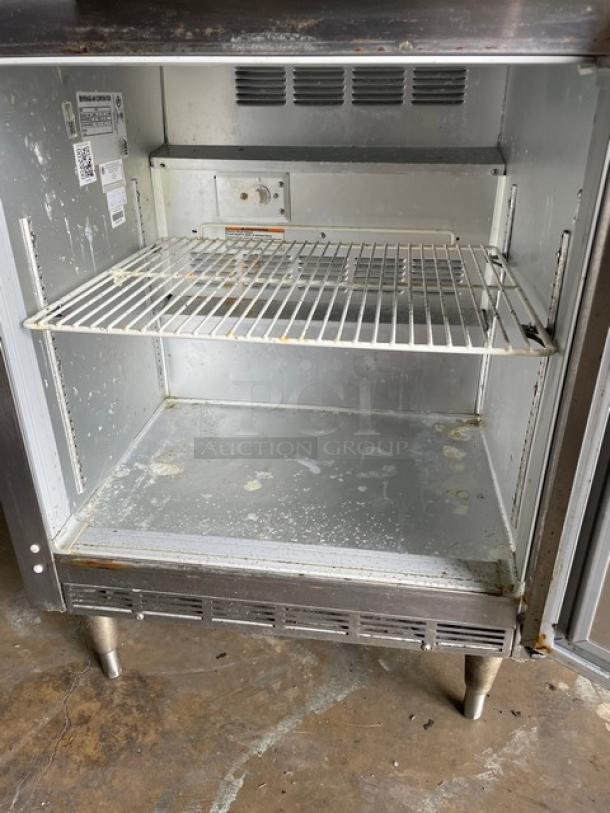 Beverage-Air single door 27" worktop freezer, model WTF27A, stainless steel, with poly coated wire rack, on legs. Visible interior wear.