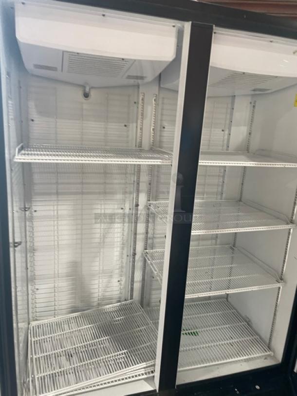 Kool-It 2022 Signature Series black double glass door refrigerator, poly-coated wire racks, commercial use.