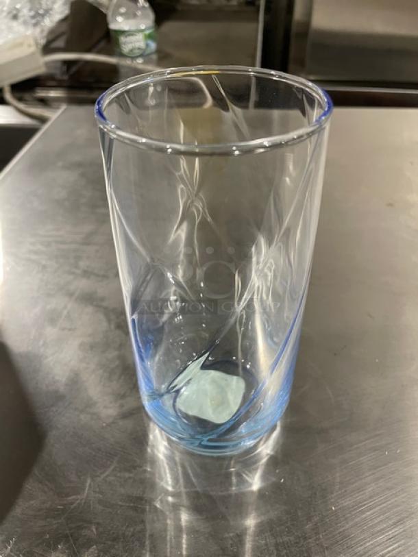 Libbey Commercial 17 oz. iced tea glass, model 46504M, clear with blue tint, new condition, elegant swirl design.