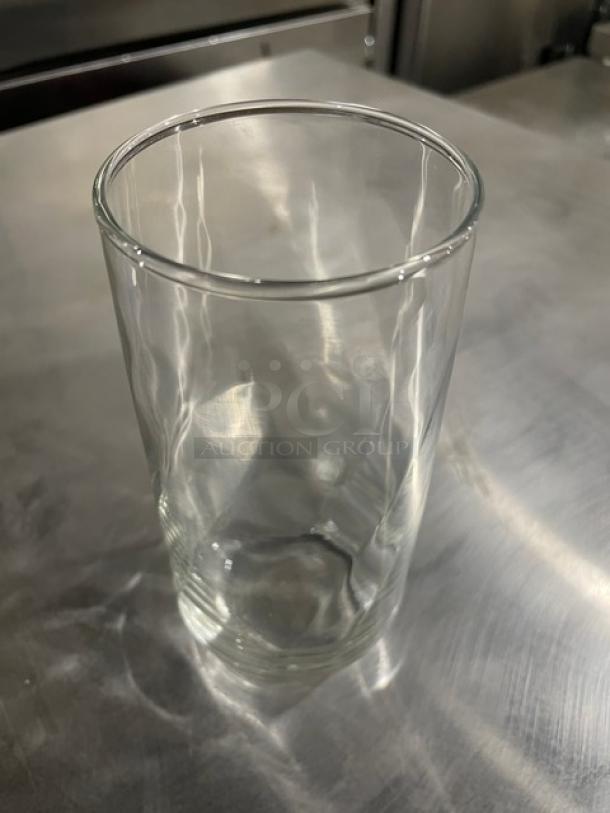 Clear 16.5 oz. iced tea/water glass, model 46501, new condition, commercial quality, sleek design, durable glass.