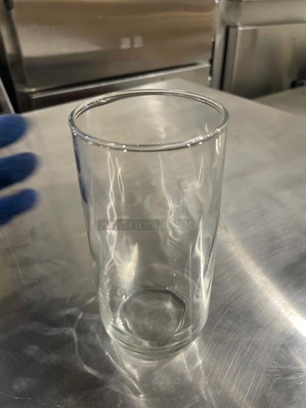 Clear commercial 16.5 oz. glass tumbler, model 46501, for iced tea or water. New condition, part of full pallet auction.