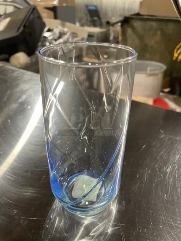 Libbey Sirrus Blue 17 oz glass, Model 46504M, features swirled design, new condition, ideal for iced tea or water.
