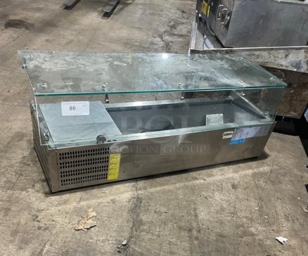 Omcan THV1200380 refrigerated benchtop merchandiser, stainless steel, glass top, electric-powered, 110V, used condition.