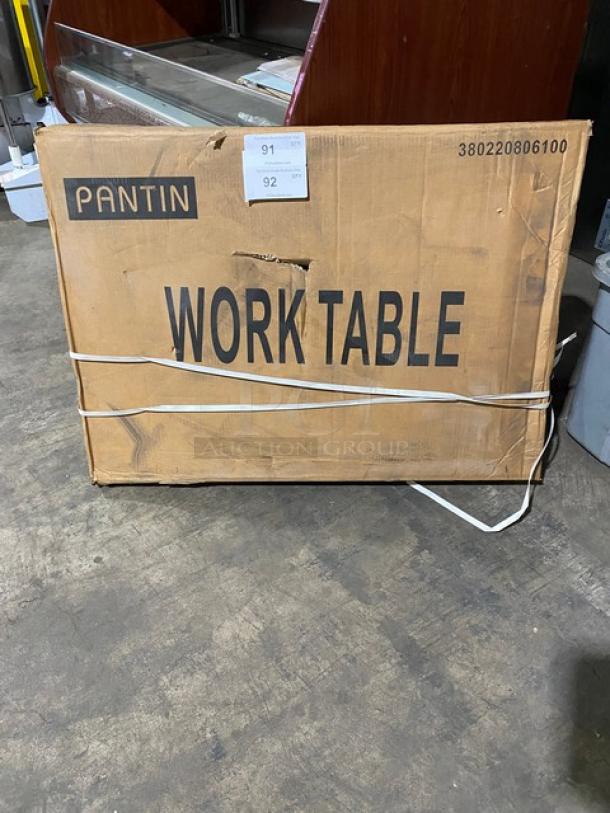 Pantin stainless steel rice cooker/worktable, 30x24 inches, double undershelf, new in box, labeled "WORK TABLE."