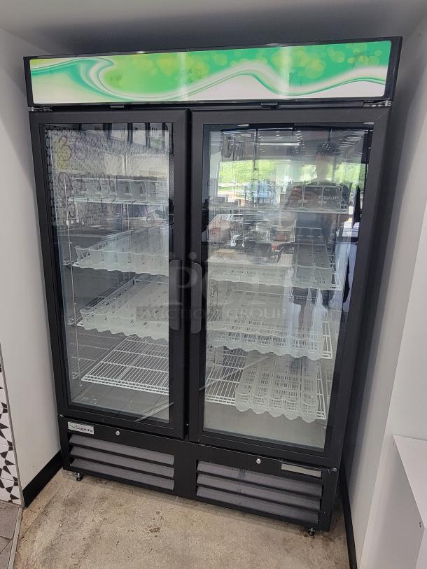 Supera PEGD-2DR-48-ES-SI-HC two-section glass door merchandiser, new condition, with adjustable shelves.