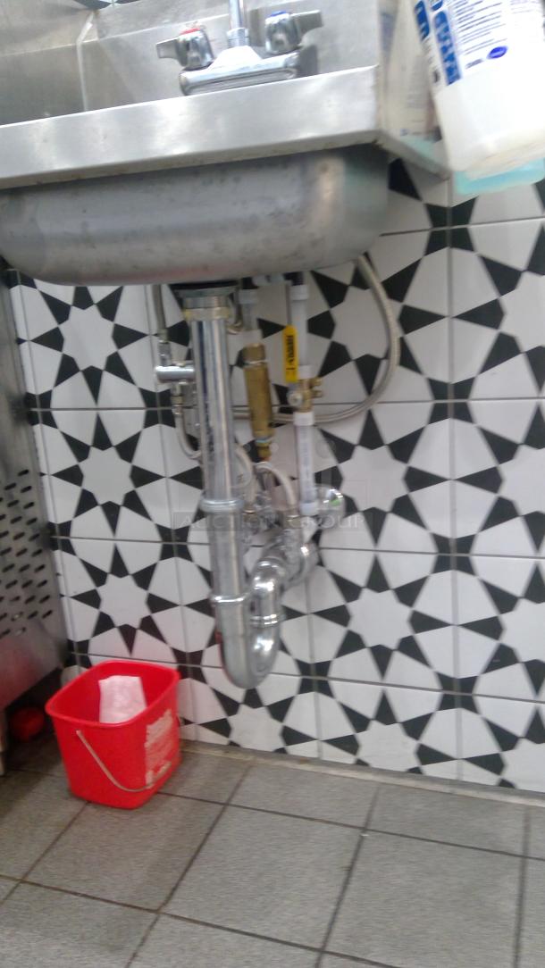 John Boos PBHS-W-1410-SSLR stainless hand sink, stainless steel, wall-mounted, dual faucet handles, visible plumbing, good condition.