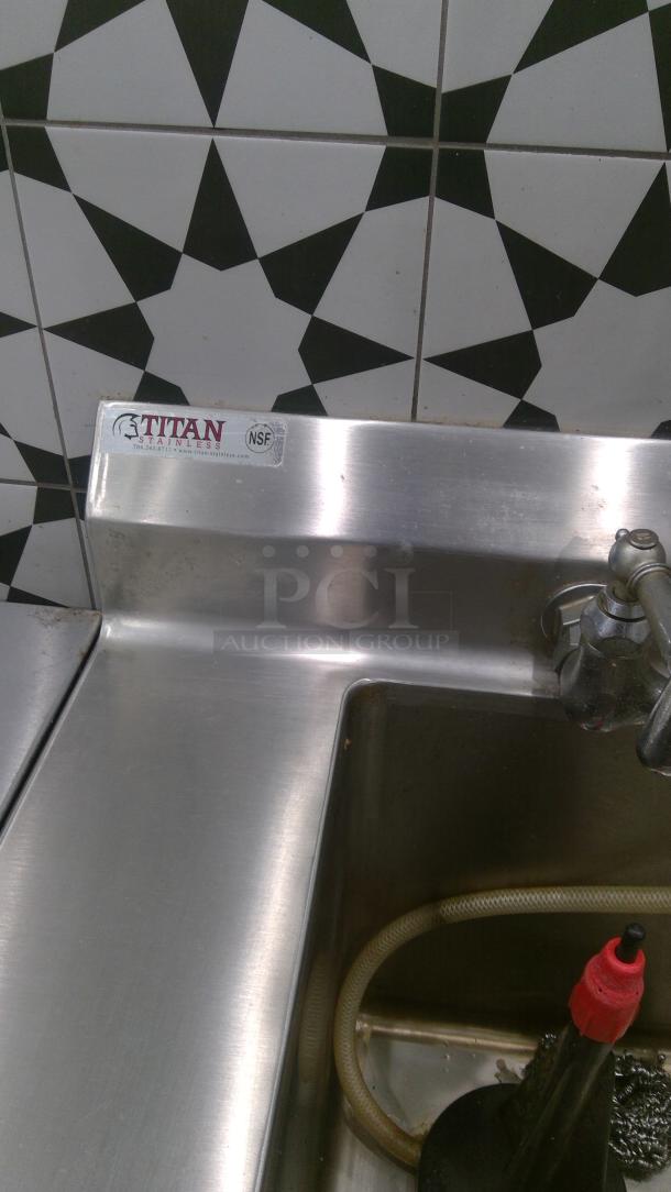 Titan 30" stainless steel sink with NSF label, featuring a robust design and sleek finish; minor wear visible.