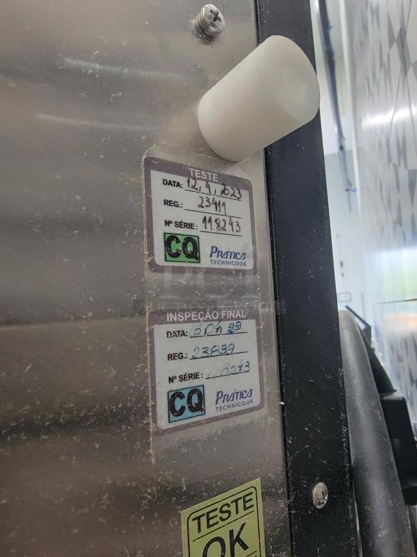 Practica Copa Express High Speed Oven, model Copa Express Black, features inspection and test labels indicating serial numbers.